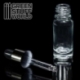 Empty glass bottle with pipette