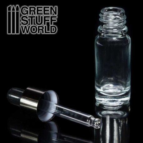 Empty glass bottle with pipette